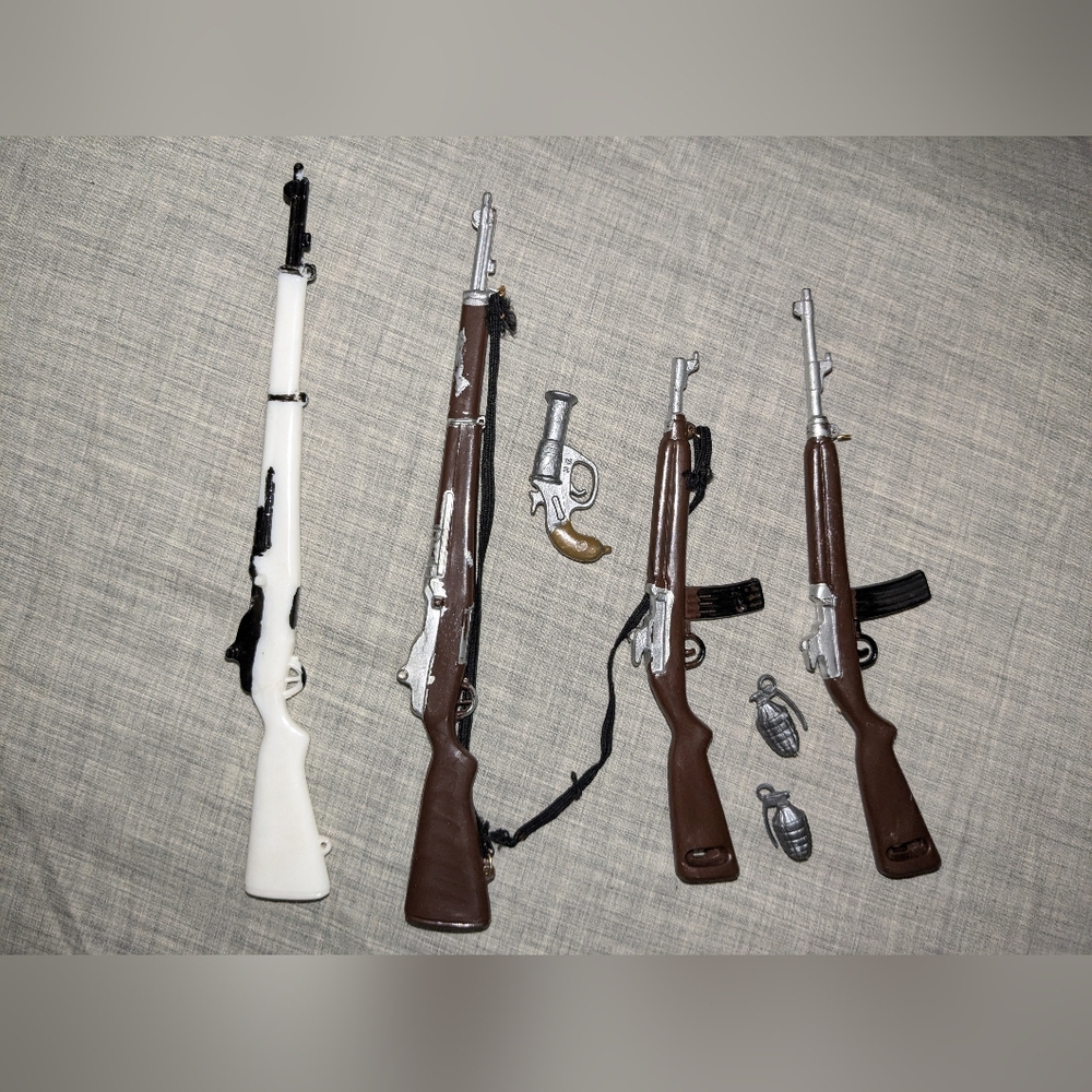 Vintage 1960s GI Joe rifles and weapons.